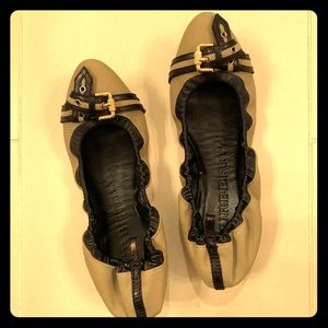 Burberry flats with buckle detail.